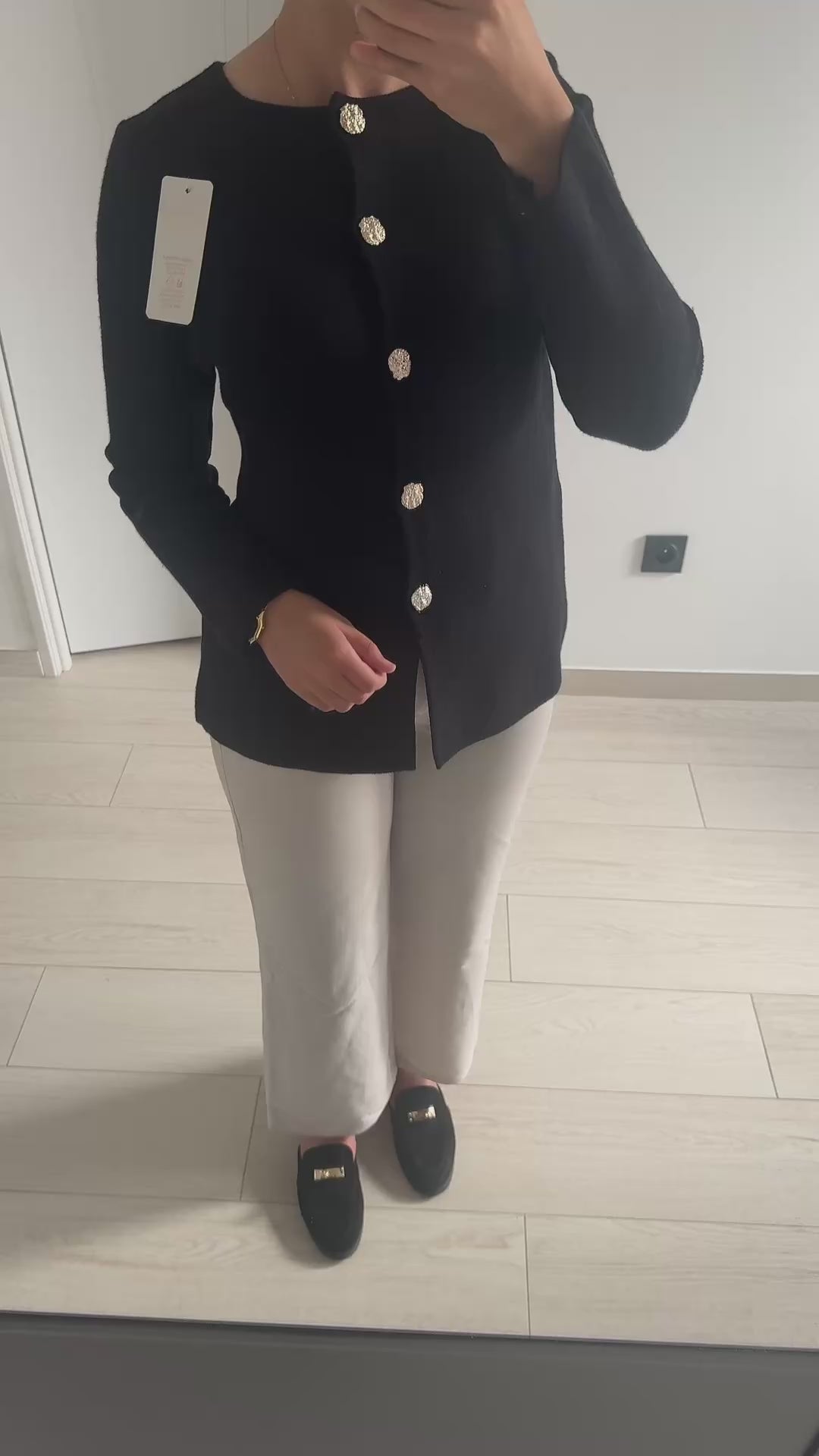 Gilet à boutons dorés