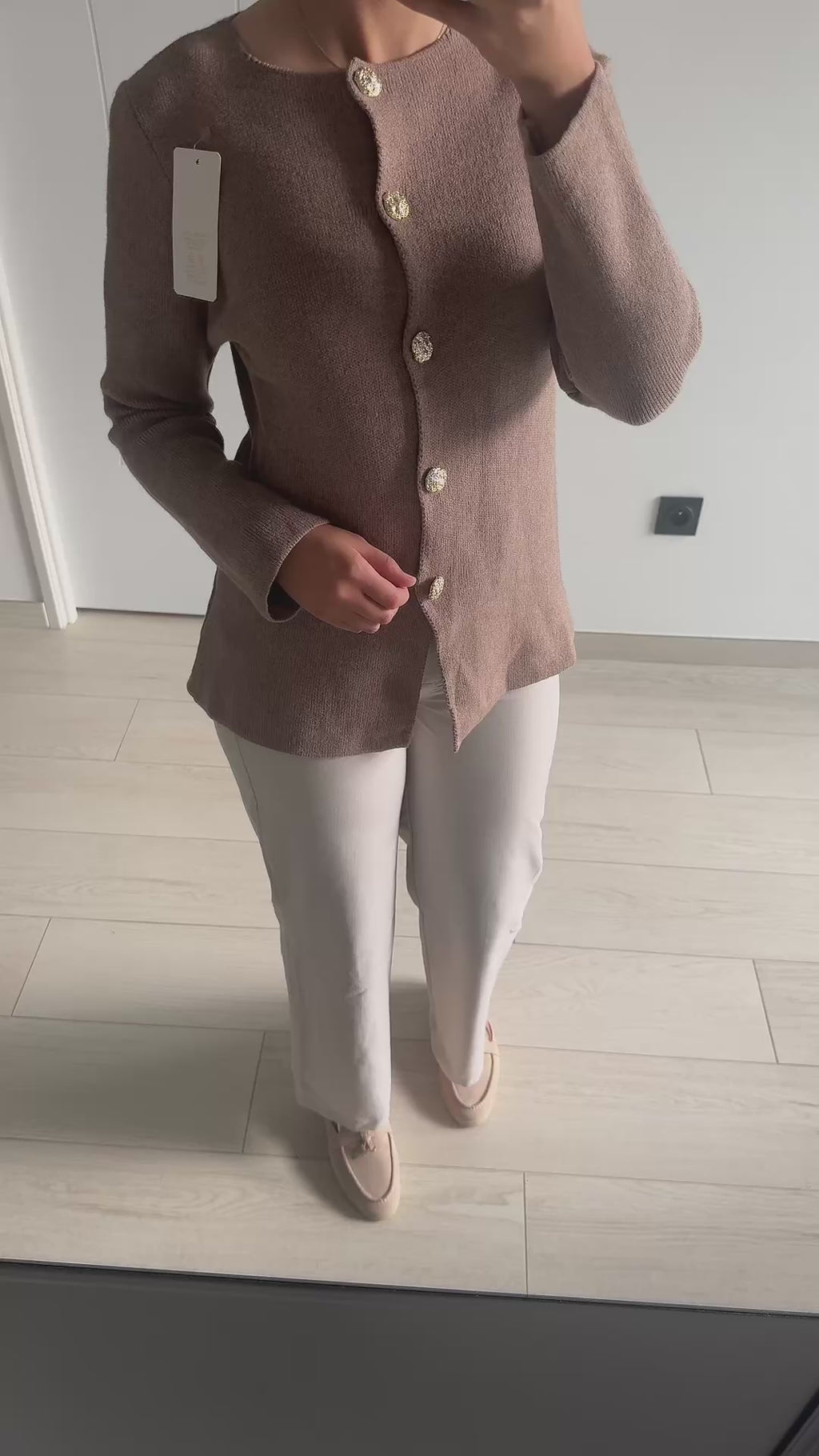 Gilet à boutons dorés